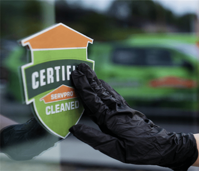 Certified: SERVPRO Cleaned sticker on a window